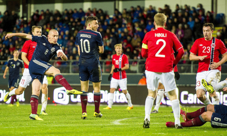 Scott Brown (left) fires home the only goal of the game.