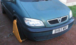 The first car in Dundee to be clamped after its owner did not pay his fine.