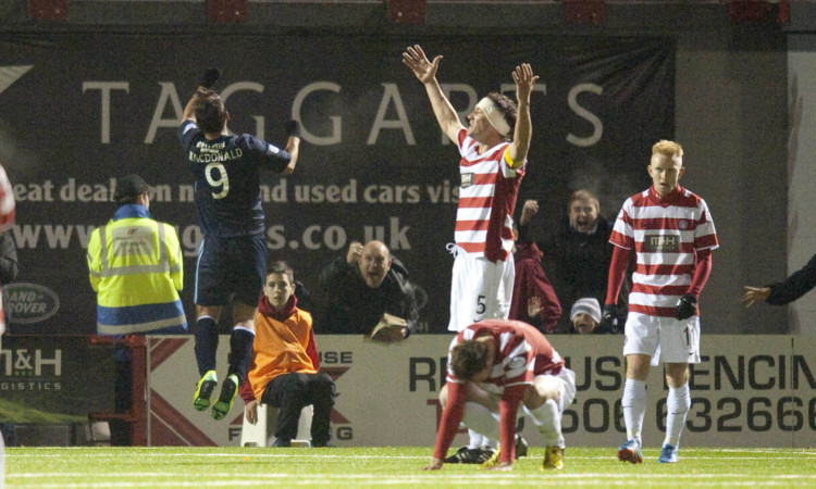 Peter MacDonald celebrates after grabbing Dundee's third goal.