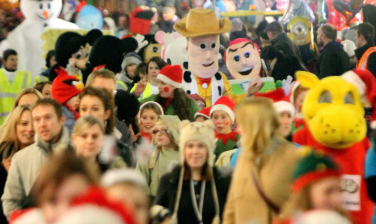 The parade moving down the High Street.