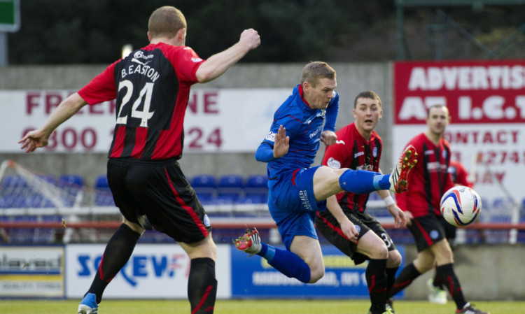 Billy McKay scores for Inverness.