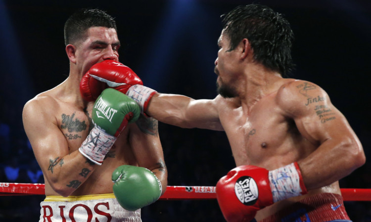 Manny Pacquiao lands a right to the head of Brandon Rios.