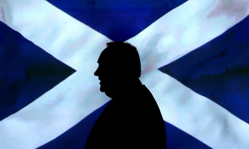 Scottish First Minister Alex Salmond leaves a press conference at St Andrews House in Edinburgh, after an agreement between the UK Government and the Scottish Government was signed for referendum for the independence of Scotland.