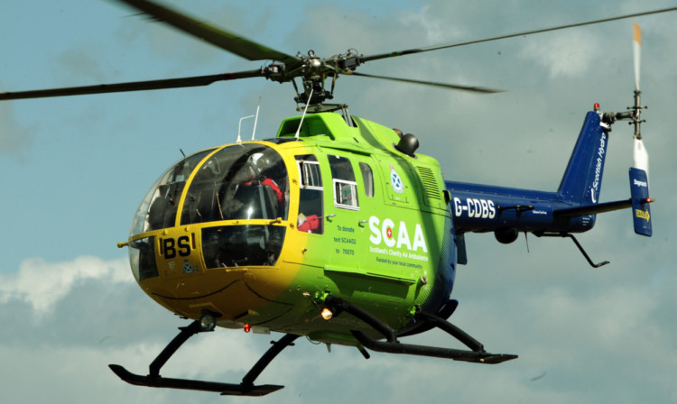 Scotlands Charity Air Ambulance came to the aid of a stricken climber on a hilltop near Dollar.