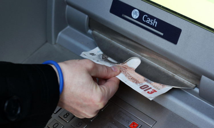 The devices were found on two cash machines in Cupar.