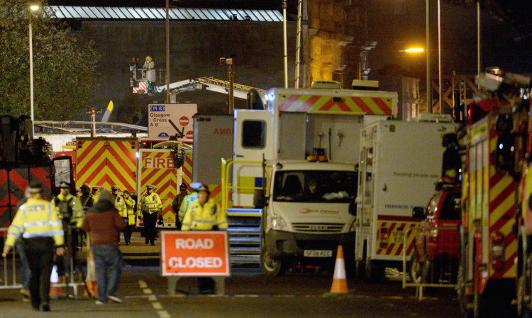 Rescue workers at the scene of the Clutha pub on Stockwell Street.