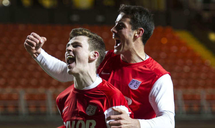 Andrew Robertson, left, celebrates after scoring to put United 3-2 up.