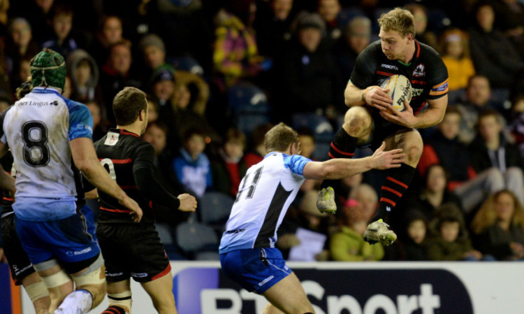 Edinburghs Greig Tonks, right, is challenged by Matt Healy on a night to remember at Murrayfield.