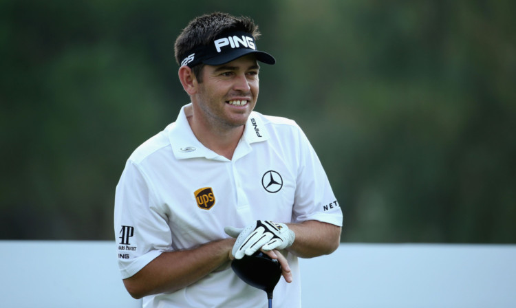 Coping with the weather delays: Louis Oosthuizen.