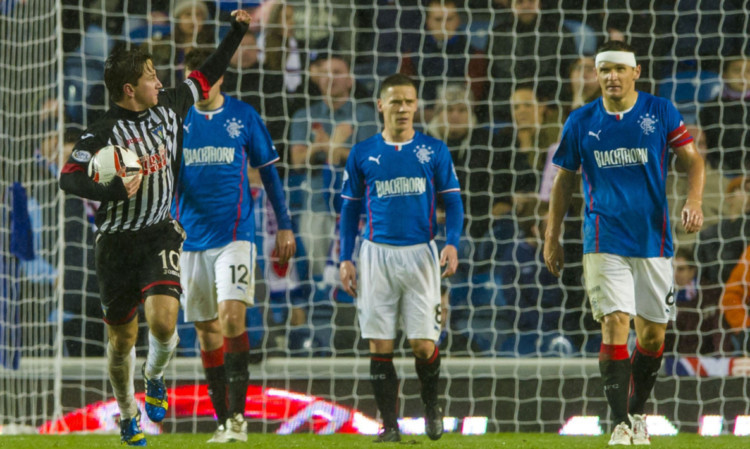 Josh Falkingham celebrates his goal in the league meeting at Ibrox last month. Dunfermline hope to have another opportunity to tackle Rangers by winning their replay.