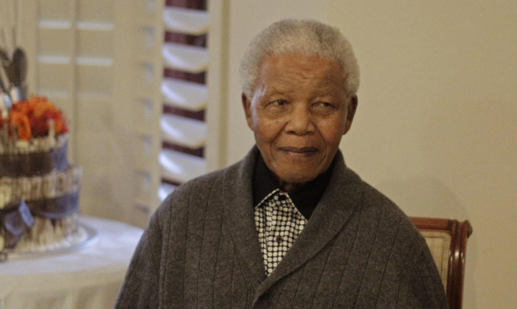 Nelson Mandela's daughter has said he is not "doing well" but is continuing to put up a courageous fight from his "deathbed."