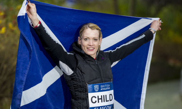 Eilidh Child with the Saltire after being named Scotland captain  for the British Athletics match in Glasgow next month.