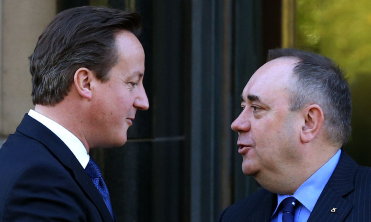 David Cameron and Alex Salmond both appear in an advert for an internet dating site for unfaithful spouses.