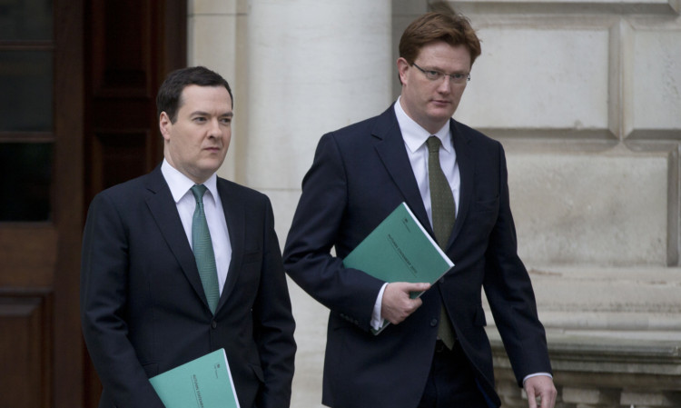 Chancellor George Osborne and Chief Secretary to the Treasury Danny Alexander leave the Treasury.