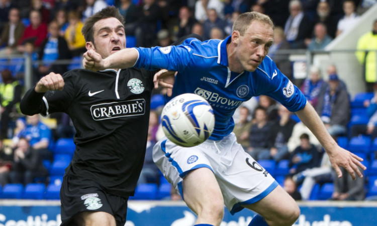 Steven Anderson, pictured in action against Hibs striker Paul Heffernan, has targeted a first-team return now his injury hell is almost over.