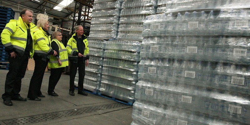 DOUGIE NICOLSON, COURIER, 30/12/10, NEWS.
DATE - Thursday 30th December 2010.
LOCATION - Strathmore Mineral Water, Forfar.
EVENT - Water for Ireland.
INFO - L/R, Brian Craig - Distribution Manager, Jenny Harkin, Emma Sim, both Finance Controllers and Bob Watson - Factory Manager.
STORY BY - Forfar office.