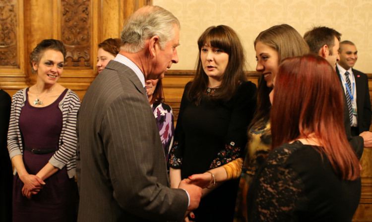 Prince Charles meets meets Clutha Bar staff at a reception at the City Chambers in Glasgow.