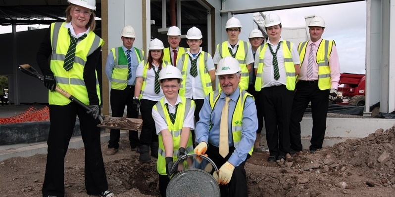 Kim Cessford, Courier 23.08.11 - pictured with the time capsule from Arbroath High School on the site of the new Asda store in Arbroath are front l to r - Ellie Williams. Kerr Norval and Ian Wightman (Construction Manager Asda) - back - Paul Carle (Site Manager), Shannon Wallace, Iain Orr (Head Teacher Arbroath High School), Kristopher Campbell, Michael Gibson, Steven kelly (Site Manager), Jordan Doyle and Tom Cornish (Construction Manager BAM)