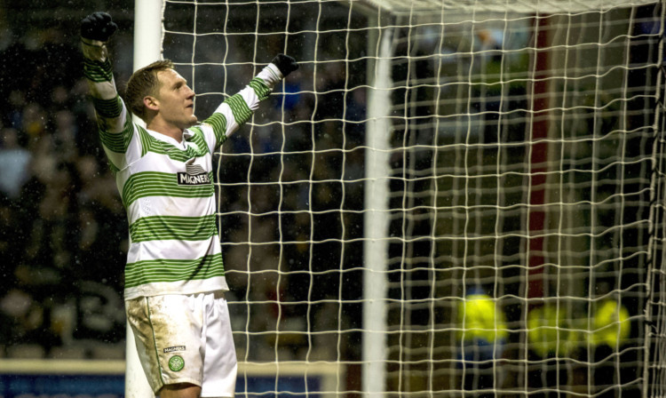 Kris Commons celebrates after making it 3-0 to Celtic.