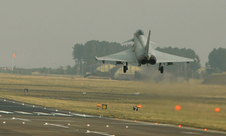 The report suggests investigating if commercial flights could replace military at RAF Leuchars.