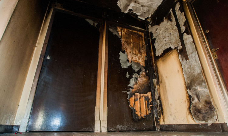 The fire damage on the top-floor landing.