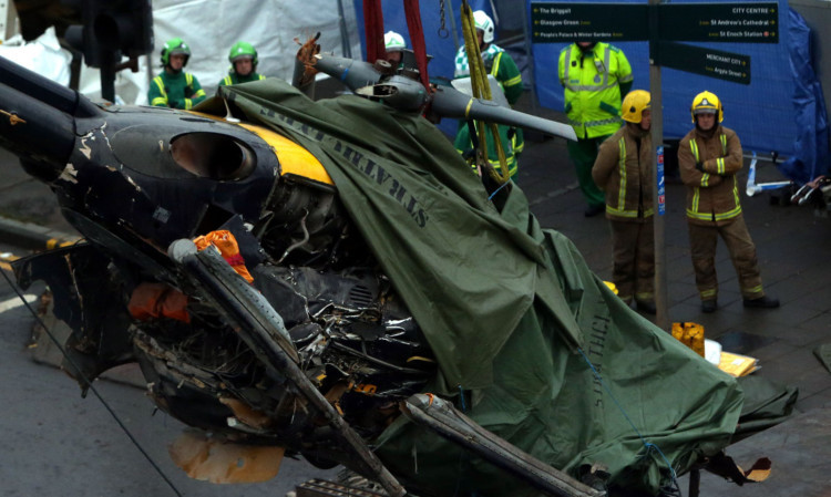 The helicopter is being examined by crash investigators after being removed from the roof the of Clutha last week.