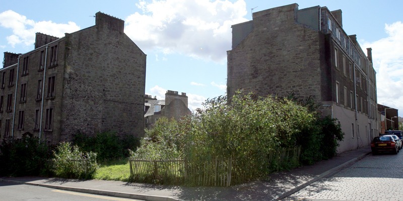 Site of proposed council housing development at the junction of, left, Nelson Street and right, Ann Street on the Hilltown, Dundee.