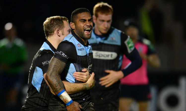 Glasgow Warriors' Niko Matawalu celebrates but his try was then ruled out by the referee for obstruction.