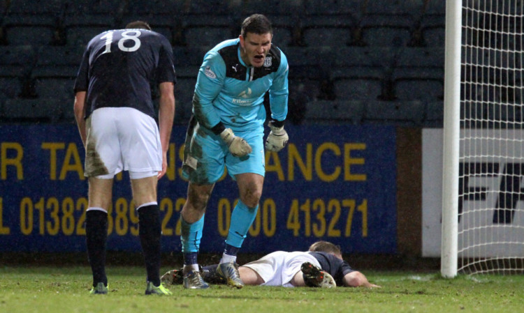 Dundee keeper Kyle Letheren blasts full-back Gary Irvine after he allowed Jordan Morton in for Cowdenbeath's winner.