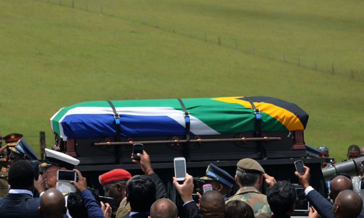 Guests attending the funeral service for former South African President Nelson Mandela.