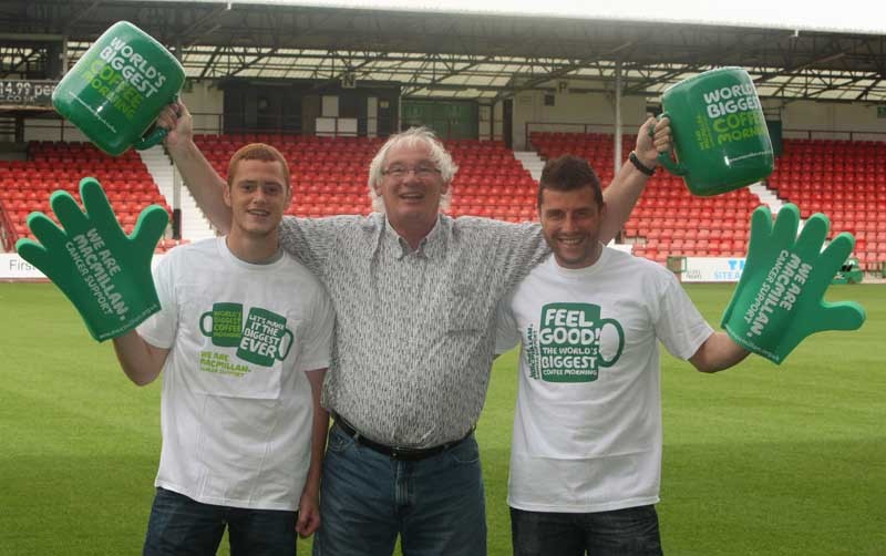 DOUGIE NICOLSON, COURIER, 13/09/11, NEWS. Pictured at East End Park, Dunfermline today, Tuesday 13th September 2011, supporting the Macmillan Worlds Biggest Coffee Morning, on the 30th September, are Dunfermline FC players Ryan Thomson, left, and Austin McCann with Jim Leishman. Story by Craig, Kirkcaldy office.