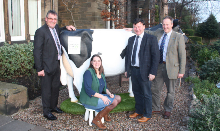 George Lawrie, Sheila Bannerman, Allan Bowie and Rob Livesey with the milkable fibreglass cow