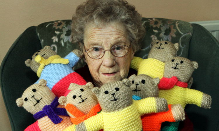 Grace Lownie and some of her teddies.