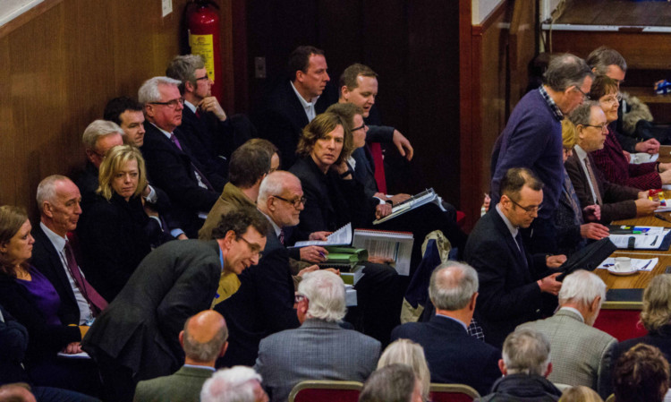 The scene at the Town Hall just before the scheduled start of Mondays hearing.