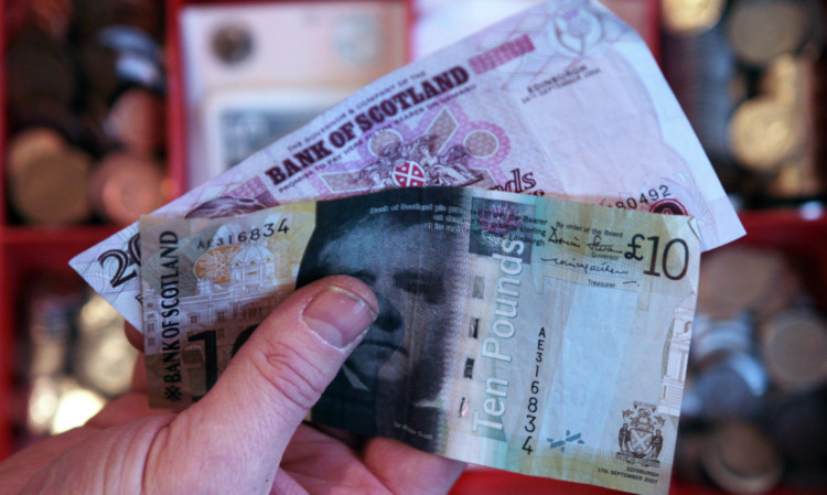 Figures show employees in Dundee are among the lowest paid in Scotland.
