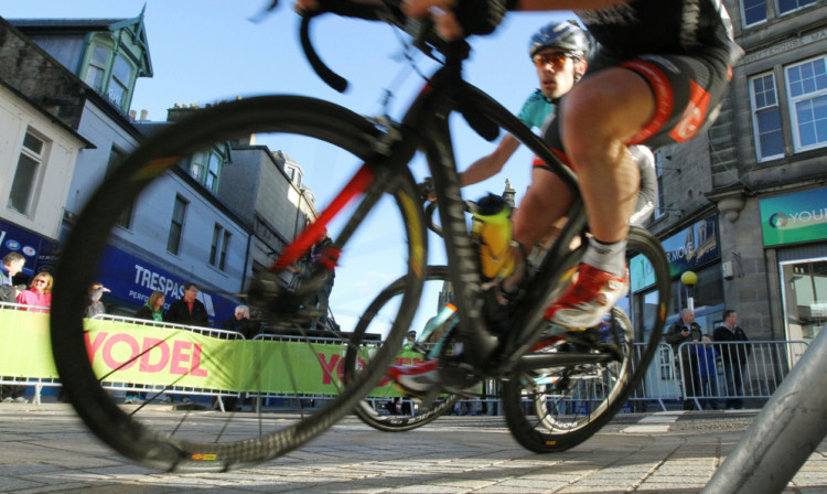 Riders turn into Kirkcaldy High Street, which some feel was shut off due to the event.