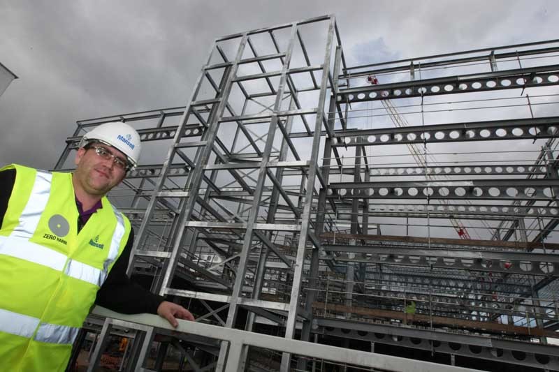 DOUGIE NICOLSON, COURIER, 22/09/11, NEWS. Pictured at the new multi storey car park at East Marketgait today, Thursday 22nd September 2011, is Councillor Will Dawson, watching the progress of the new structure. Story by Reporters.