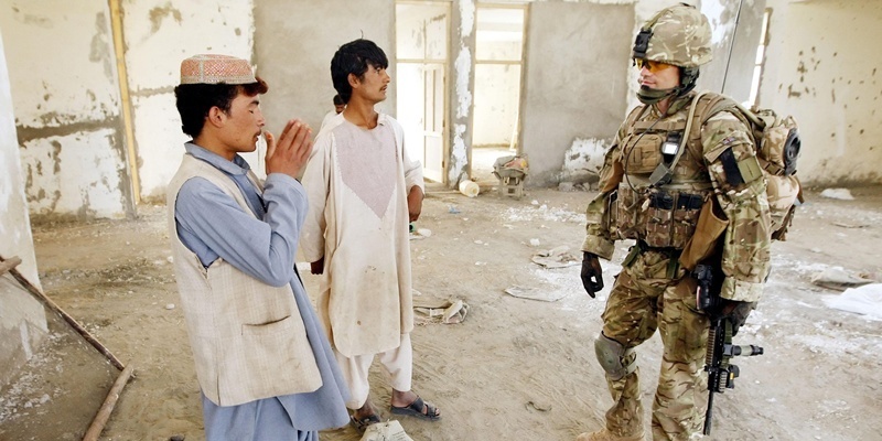 Major Nik Cavill of X-Ray Company, 45 Commando Royal Marines, at the building site of a new school in the village of Siadabad, while on patrol from Patrol Base Kalang in Afghanistan. PRESS ASSOCIATION Photo. Picture date: Wednesday July 27, 2011. See PA story DEFENCE Afghanistan. Photo credit should read: Danny Lawson/PA Wire