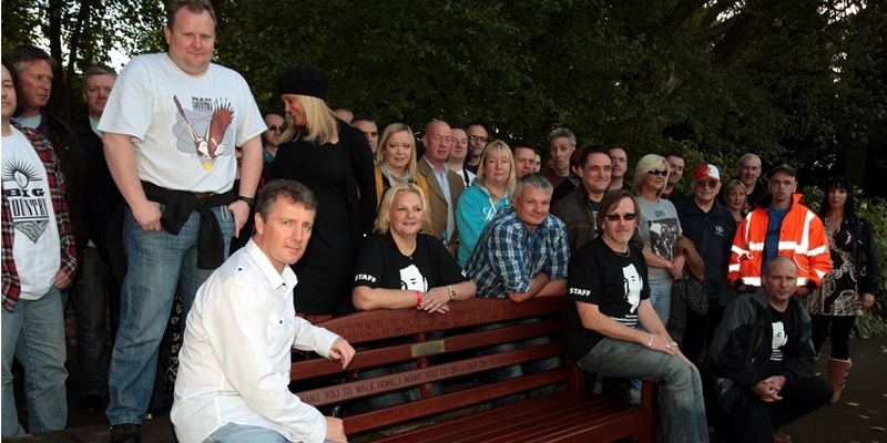 John Stevenson, Courier, 24/09/11. Fife.Dunfermline, Pittencrieff Park, Memorial bench to Big Country's Stuart Adamson unveiled after fans fundraiser. Pic shows fans gathered round the bench.