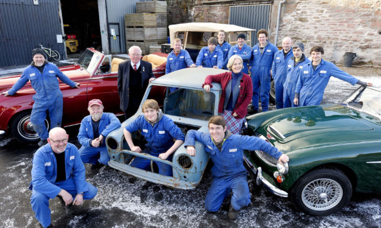 Classic Restorations (Scotland) Ltd, Alyth, Perthshire, 06/12/2013:
Charles Palmer (in black jacket, managing director and formerly company owner) with admin director Christine Ferguson, and the team.
Photography for Cooperative Development Scotland / Scottish Enterprise from:  Colin Hattersley Photography - colinhattersley@btinternet.com - www.colinhattersley.com - 07974 957 388