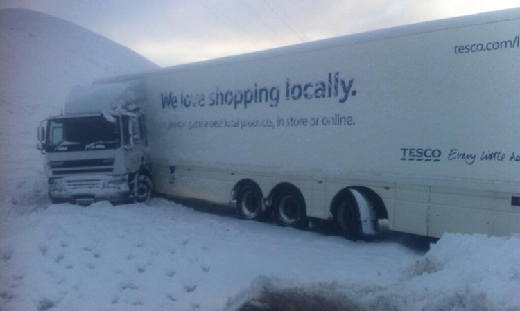 A jack-knifed Tesco lorry on the A9 at Drumochter.