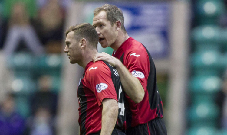 St Johnstone's Patrick Cregg (left) is consoled by team-mate Frazer Wright after being sent off just seconds after coming on as a substitute.