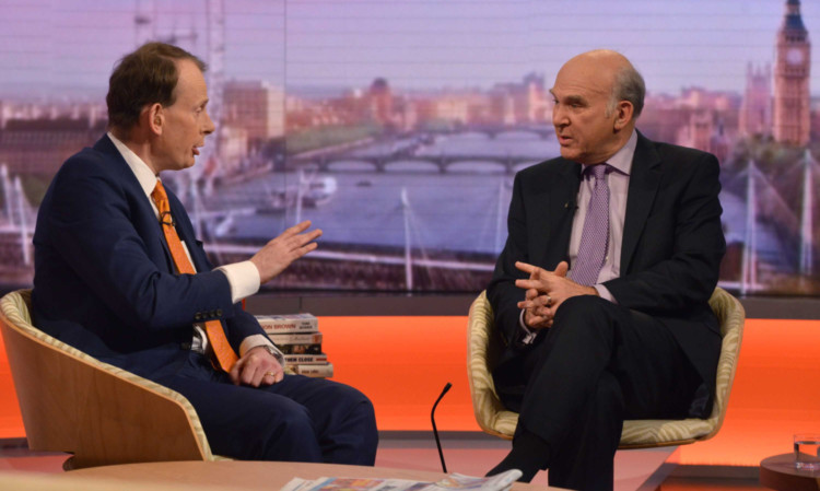 Appearing on The Andrew Marr Show, Business Secretary Vince Cable, right, said a cap on movement within the EU was not going to happen, and claimed the Tories were in a panic over immigration.