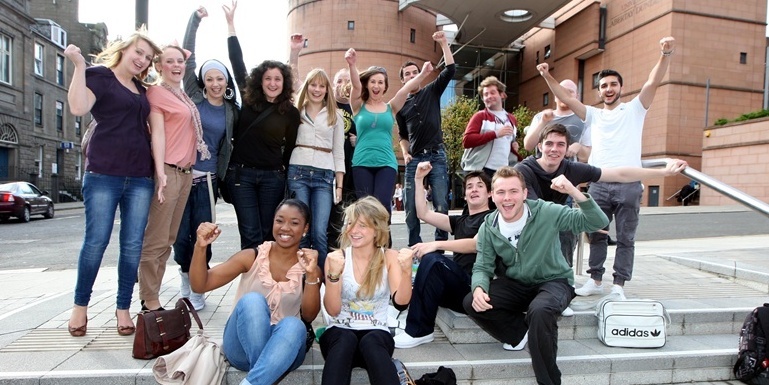 Steve MacDougall, Courier, Abertay University, Bell Street, Dundee. Students celebrate outside the university after hearing the news that the merger will not go ahead.