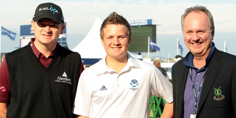 John Stevenson, Courier, 29/09/11. Fife. St Andrews The Old Course,  Golf Course, The Dunhill Championship.. Pic shows young golfer Alasdair  Mc Dougall(centre) with Paul Lawrie,(left) and Euan Lowdon, Chief Executive St Andrews Links Trust.