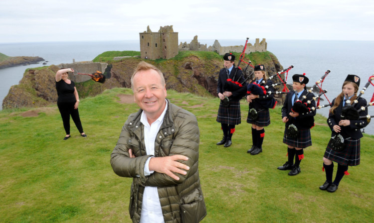Jim Kerr from Simple Minds launches the Stonehaven Open Air in the Square Hogmanay Party programme at Dunnottar Castle.