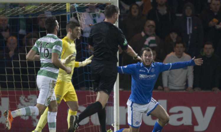 Saints striker Stevie May appeals for a penalty but referee Craig Thomson waves play on.