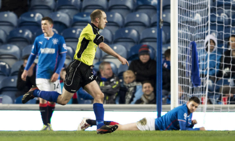 Jamie Longworth turns away to celebrate the goal that stunned Ibrox and earned Stranraer a point.