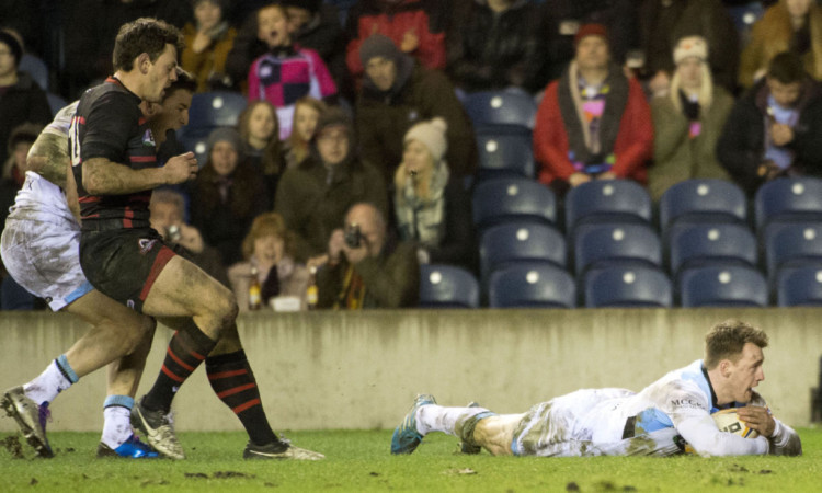 Stuart Hogg wins the race for the key try of the first leg.
