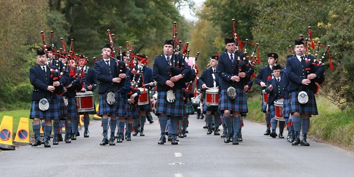 Kris Miller, Courier, 08/10/11. Picture today at funeral of David Murray at Parkgrove Crematorium, Friockheim. Hundreds of people packed the crematorium to see off the well known local businessman. Pic shows the Carnoustie and District Pipe Band who piped the hearse into the crematorium.